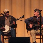 Carl Johnson and Jim Lloyd playing banjo and guitar