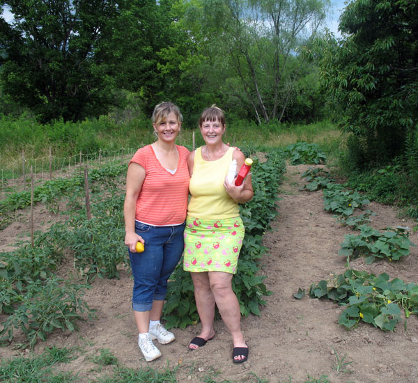 Audrey Hollen and Willa Jackson in a garden