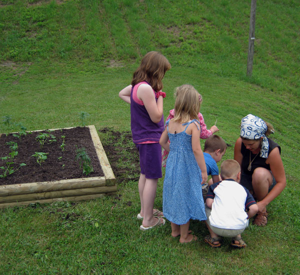 Jemma Jewski teaches gardening to children