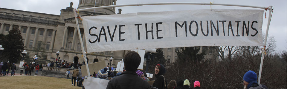Banner "Save the Mountains" at I Love Mountains Day