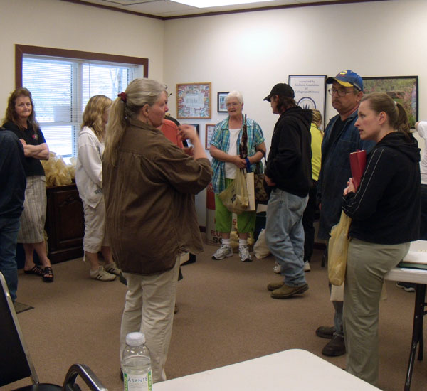 Participants discuss planting with Nancy Seaberg