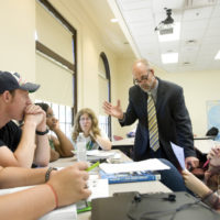 Richard Cahill during one of his classes.  Cahill is an Associate Professor of History and the director of the Center for International Education. Elizabeth Sharp, '14, Andrew Cooper, '14, Robnesha Felton, '12, Mary Ryks, '14, Dr. Cahill, and Kendel Arthur, '12.  Featured in the Fall 2010 Magazine, taken 20100914.