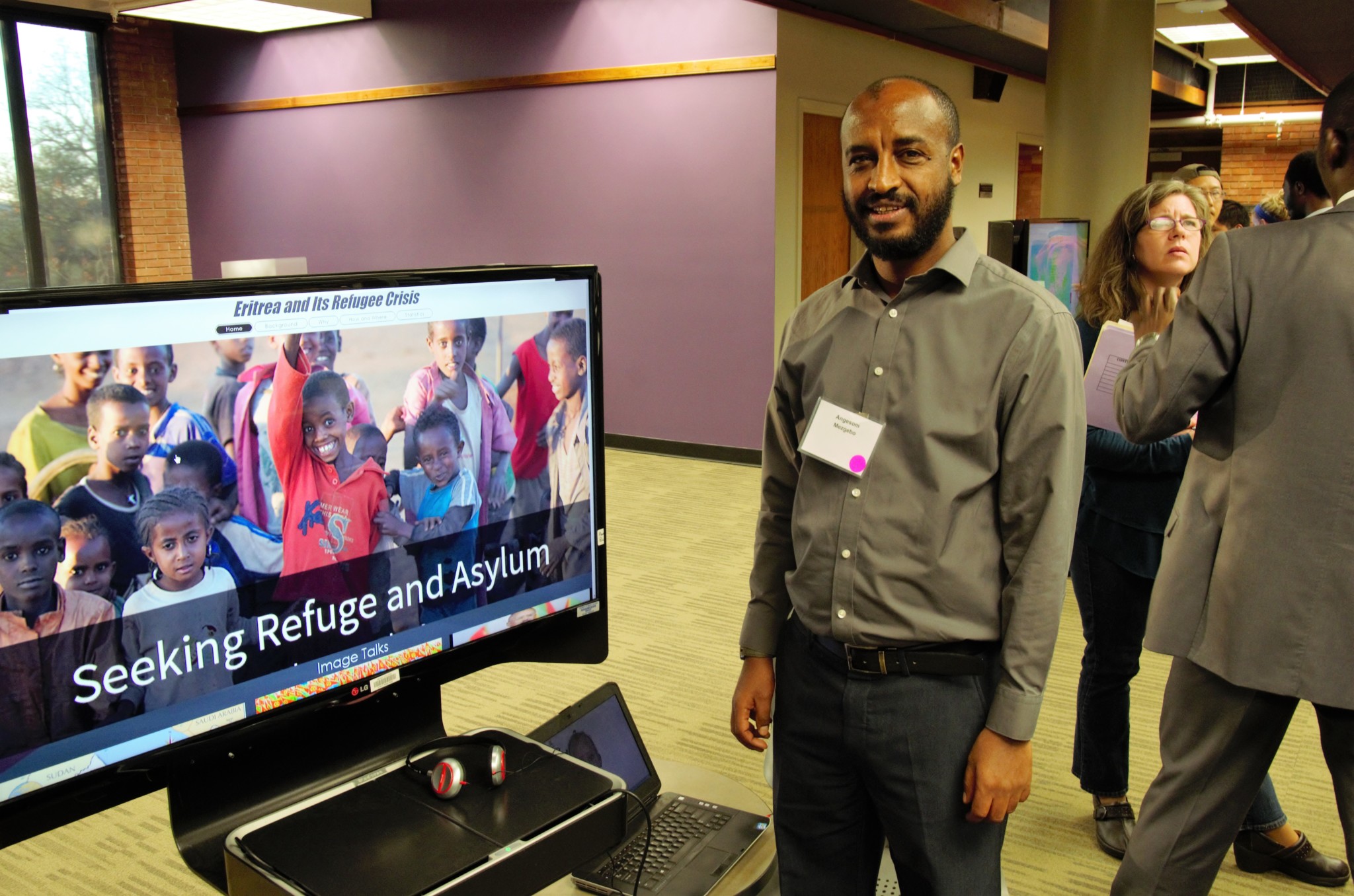 Student posing for a picture at the 410 expo