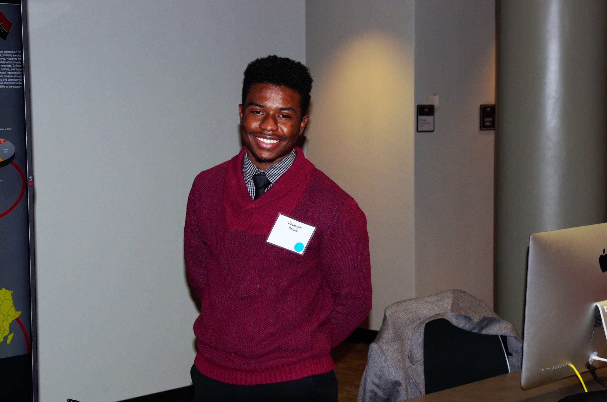 Expo participant, A student posing for picture at GSTR 410 Expo: Fall, 2016