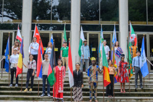 International Berea students pose with their respective countries' flags