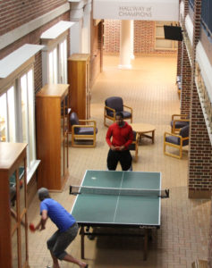 Students playing ping pong
