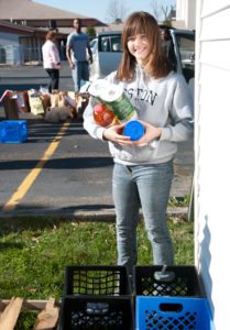 Lilly Belanger collects food for the Berea Community Food Bank