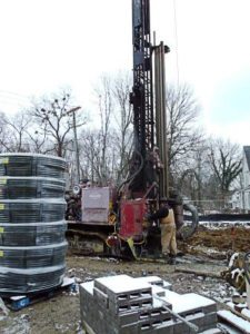 Drilling geothermal wells.