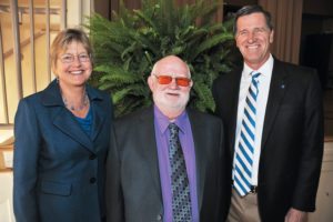 Laurie Roelofs, Burt Boyer and President Dr. Lyle Roelofs