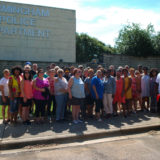 Civil Rights Tour group photo in front of Birmingham Police Department