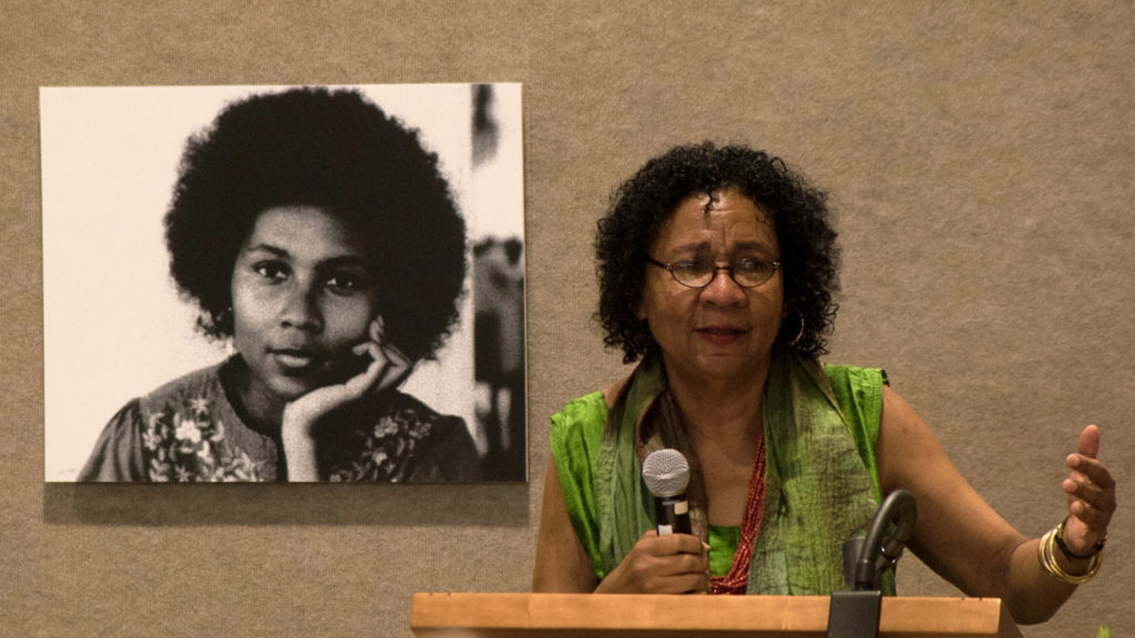bell hooks speaking at a podium