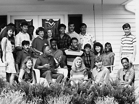 Alex Haley on porch with students